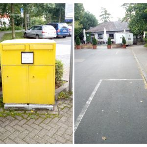 Das Bild zeigt einen Briekasten, der nach Meinung der SPD am Bahnhofsvorrplatz fehlt (linke Bildhäfte) und die erneuerrungsbedürftigen Bodenmarkierung der Parkplätze für außergewöhnlich Gehbehinderte im Bereich des Südbahnhofs